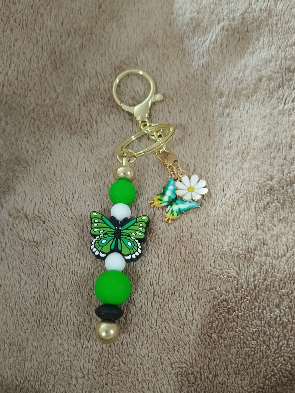 Gold Keychain with Green Butterfly and Floral Charm
